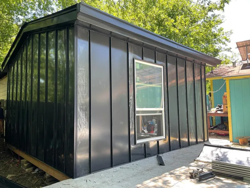 Black standing seam metal wall panels for Roof Inspection in Casas Adobes