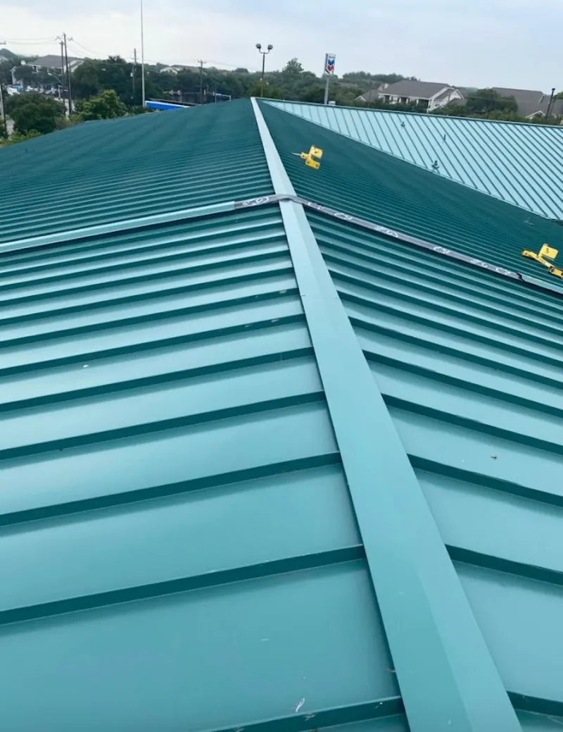 Green commercial metal roof ridge and valley for Metal Roof Repair in Casas Adobes